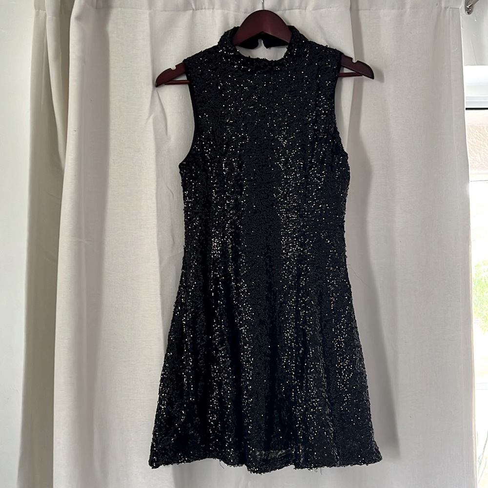 INA black sequin dress.